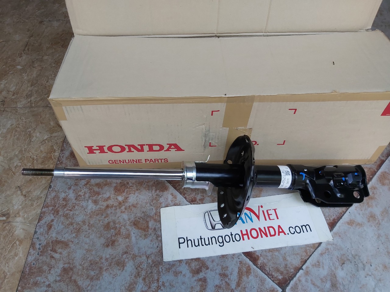 Giảm xóc trước xe Honda City